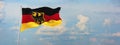 flag of Germany at cloudy sky background on sunset, panoramic view. Patriotic concept about Germany and copy space for wide banner