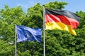 Flag of Germany and Europe waving at wind Royalty Free Stock Photo