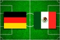 Flag Germany - Mexico on the football field. Football match