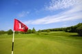 Flag on golf course Royalty Free Stock Photo