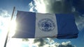 Flag of Grand Rapids city, city of Michigan, United States of America, waving at wind in blue sky. 3d rendering
