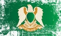 Flag of the Great socialist people`s Libyan Arab Jamahiriya, Muammar Gaddafi, Africa. Wrinkled dirty spots. Royalty Free Stock Photo
