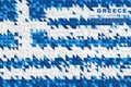 Flag of Greece. Abstract background of small triangles in the form of colorful blue and white stripes of the Greek flag