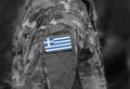 Flag of Greece on soldiers arm collage Royalty Free Stock Photo