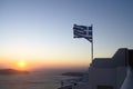 Flag of Greece, Sunset on Santorini island Royalty Free Stock Photo