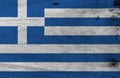 Grunge Greek flag texture, Nine stripes of blue and white; a white cross on a blue square.