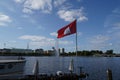 Flag of Hamburg ,white castle with three towers on red background, hoisted in restaurant in Binnenalster. Royalty Free Stock Photo