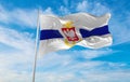 flag of Hydrographic survey and Maritime Office, service blue , Poland at cloudy sky background on sunset, panoramic view. Polish