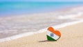 Flag of the India in the shape of a heart on a sandy beach. Royalty Free Stock Photo