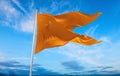 flag of Indo-Aryan ethnoreligious groups Hindus at cloudy sky background, panoramic view. flag representing ethnic group or