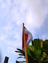 Flag of Indonesia red and white with blue Sky background