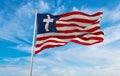 flag of Jesusland waving in wind at cloudy sky. love holy spirit faith, people hope in easter, religion concept. Copy space Royalty Free Stock Photo