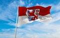 flag of Landeshauptstadt Duesseldorf at cloudy sky background on sunset, panoramic view. Federal Republic of Germany. copy space Royalty Free Stock Photo