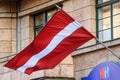 Flag of Latvia waves in Riga city Royalty Free Stock Photo