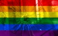 Flag LGBT community pride on a broken glass background. Raimbow gay culture symbol. Concept collage