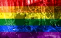Flag LGBT community pride on a broken glass background. Raimbow gay culture symbol. Concept collage