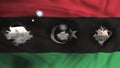 Flag of Libya waving and bombed city on the background Royalty Free Stock Photo