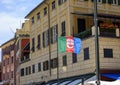 The Flag of Liguria flying in the wind in Portofino, Italy.