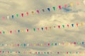 flag line with cloudy sky .