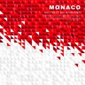 Flag of Monaco. Abstract background of small triangles in the form of colorful red and white stripes of the Monegasque flag