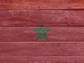 Flag of Morocco on wooden wall background. Grunge Moroccan flag texture. Royalty Free Stock Photo