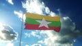Flag of Myanmar waving at wind against beautiful blue sky. 3d rendering