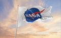 flag of NASA, National Aeronautics and Space Administration waving in the wind. USA National defence. Copy space. 3d illustration Royalty Free Stock Photo