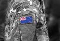 Flag of New Zealand on soldier arm. Flag of New Zealand on military uniforms (collage).