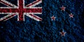 Flag of New Zealand on a textured background. Concept collage