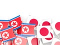Flag pins of North Korea DPRK and Japan isolated on white