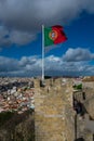 Flag of Portugal. Saint George Castle Castelo de Sao Jorge Royalty Free Stock Photo