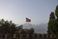 Flag of Portugal on the top of Sao Jorge castle in Lisbon, Portugal Royalty Free Stock Photo