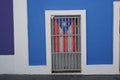 Flag of Puerto Rico behind bars