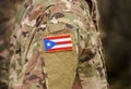 Flag of Puerto Rico on military uniform. Army, armed forces, soldiers. Collage Royalty Free Stock Photo