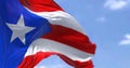 Flag of Puerto Rico waving in the wind on a clear day Royalty Free Stock Photo