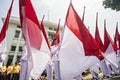 The flag-raising troops carried the red and white flag, the Indonesian state flag, in a parade in Bandung, East Java