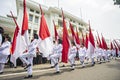 The flag-raising troops carried the red and white flag, the Indonesian state flag, in a parade in Bandung, East Java