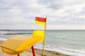 Flag red-yellow of lifeguards on the Black Sea coast Royalty Free Stock Photo