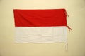 The flag of the Republic of Indonesia is red which means brave and white which means holy