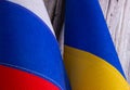 Flag of Russia and Ukraine on a destroyed wall close-up. Conflict of countries and the threat of war Royalty Free Stock Photo