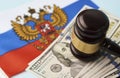 Flag of Russia with US dollar money and Judge gavel
