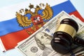 Flag of Russia with US dollar money and Judge gavel