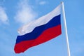 Russian flag waving in the wind over blue sky Royalty Free Stock Photo