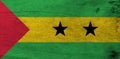 Flag of Sao Tome and Principe on wooden plate background. Grunge Sao Tome and Principe flag texture.