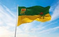 flag of Saskatchewan , Canada at cloudy sky background on sunset, panoramic view. Canadian travel and patriot concept. copy space