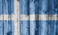 Flag of Shetland Islands on weathered wood