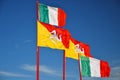 Flag of Sicily waving along with Italian one Royalty Free Stock Photo