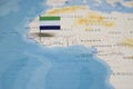 The Flag of sierra leone in the world map Royalty Free Stock Photo