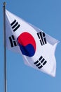 Flag of South Korea on a flagpole against the blue sky