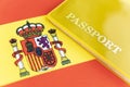 Flag of spain with passport. Travel visa and citizenship concept. residence permit in the country. a yellow document